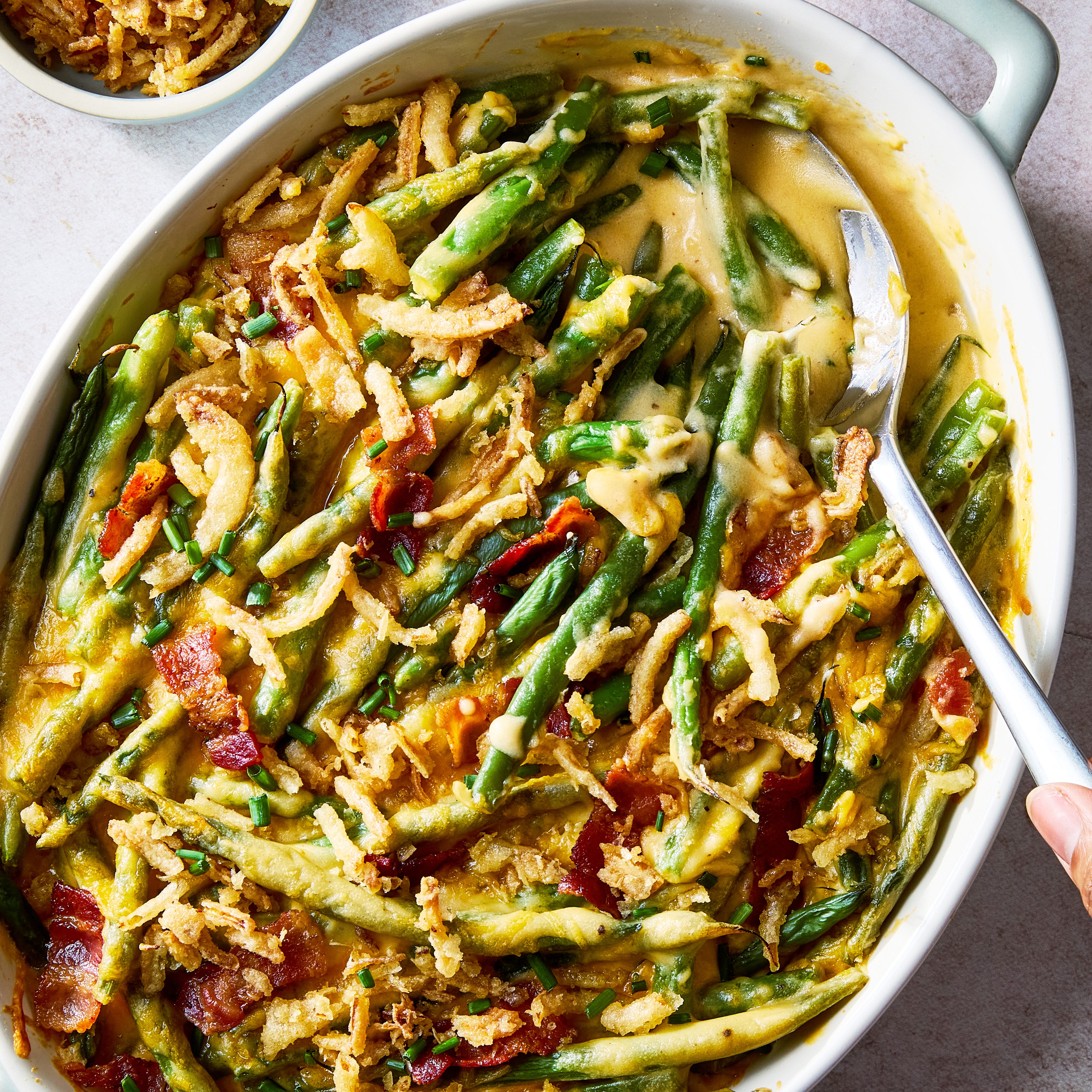 loaded green bean casserole topped with bacon