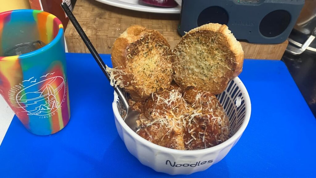 Four vodka/gingers led to angel hair with red sauce and meatballs, plus garlic cheesy toast.
