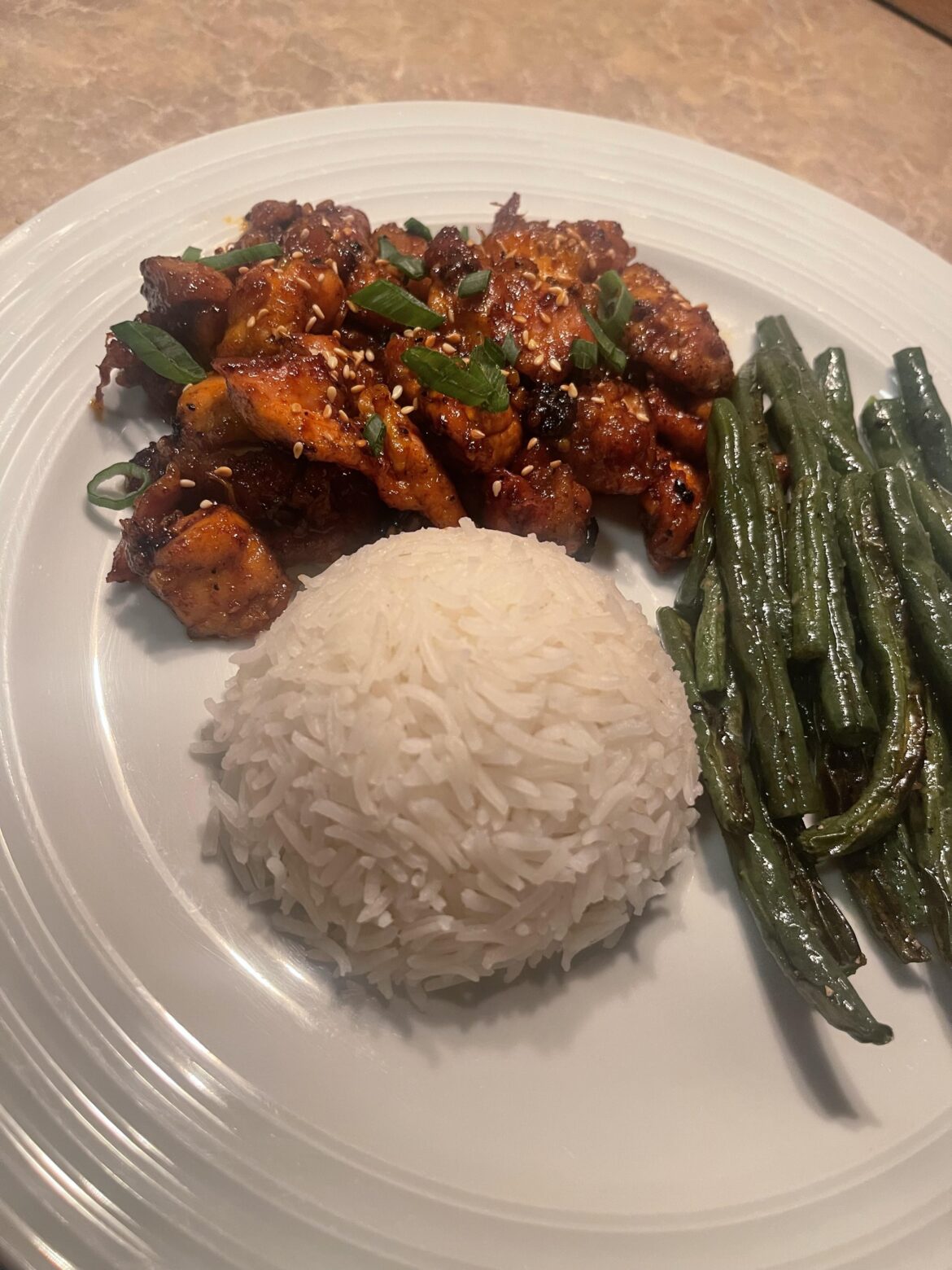 [homemade] Gochujang, hot honey, & garlic chicken with basmati rice and green beans