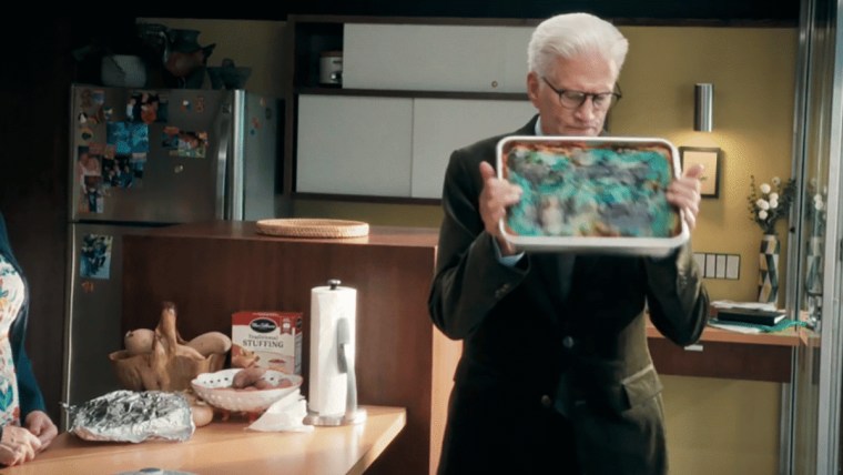 Ted Danson (as Charles) with the lasagna battery in “A Man on the Inside” on Netflix.