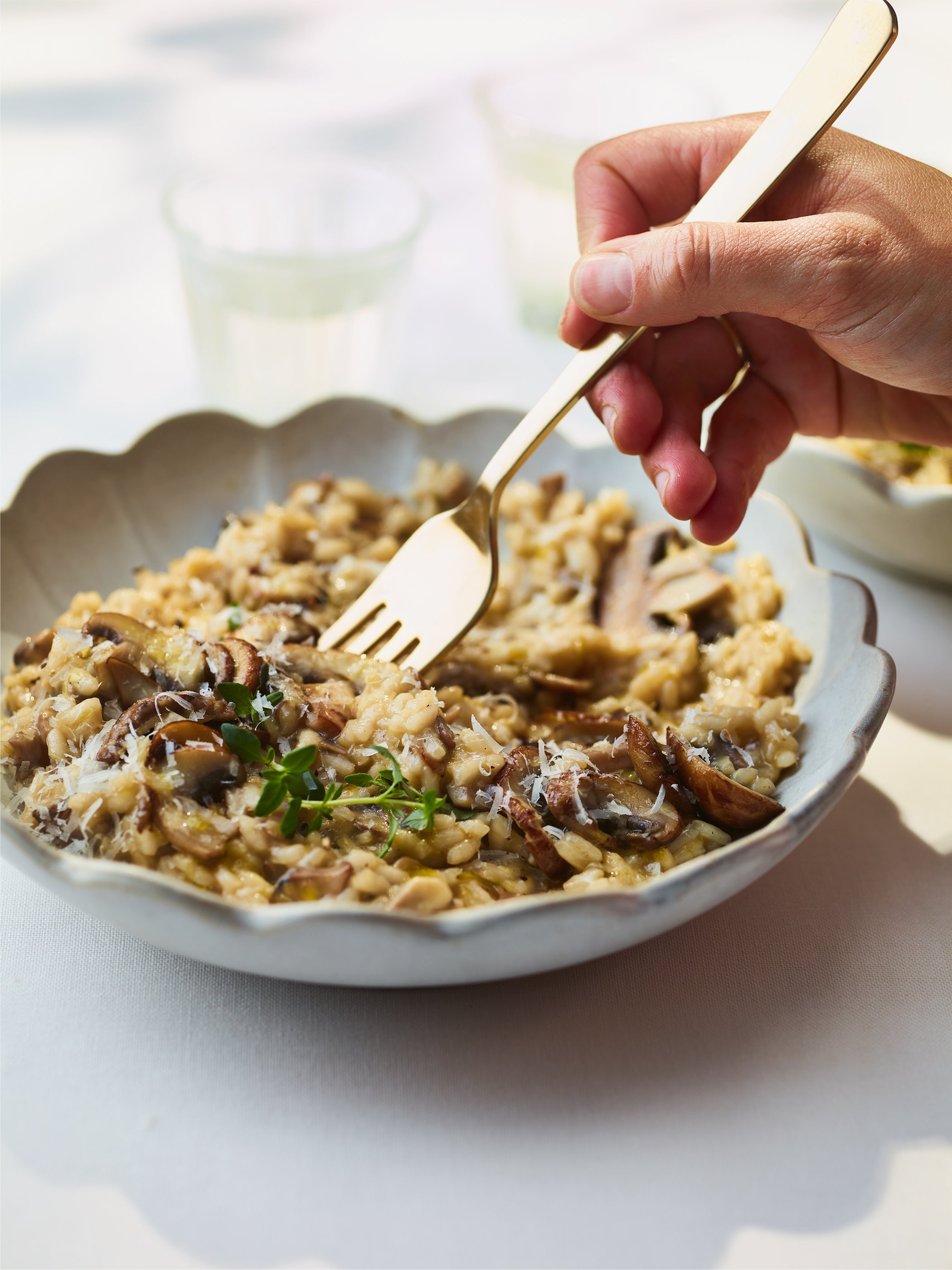 Joe Swash’s creamy risotto leans into comfort, finished with golden mushrooms for depth