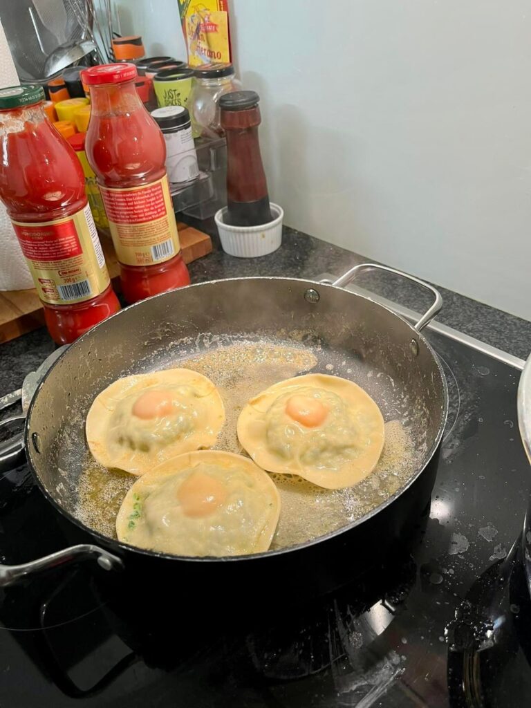 Runny-yolk raviolo and ossobucco with saffron risotto