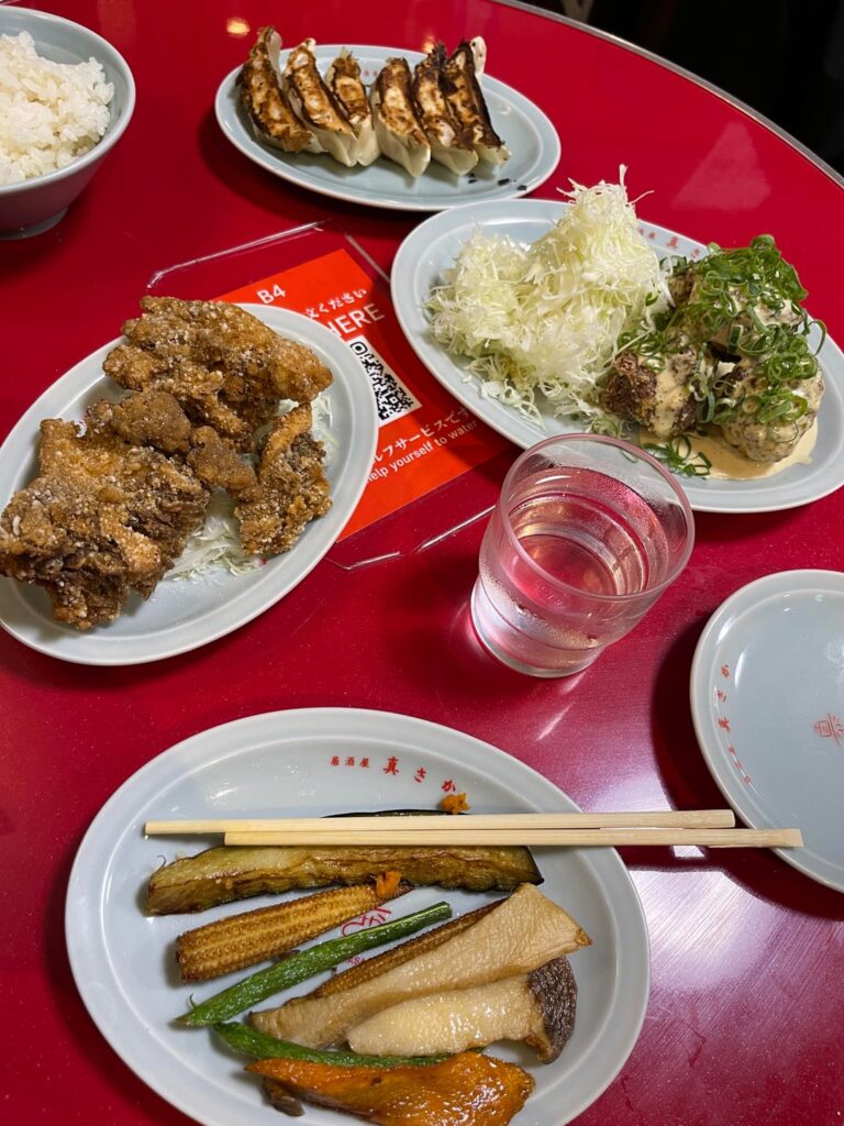 me eating at a vegan izakaya in shibuya, tokyo for almost everyday