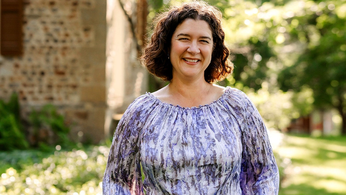 Nova Cadamatre smiles.