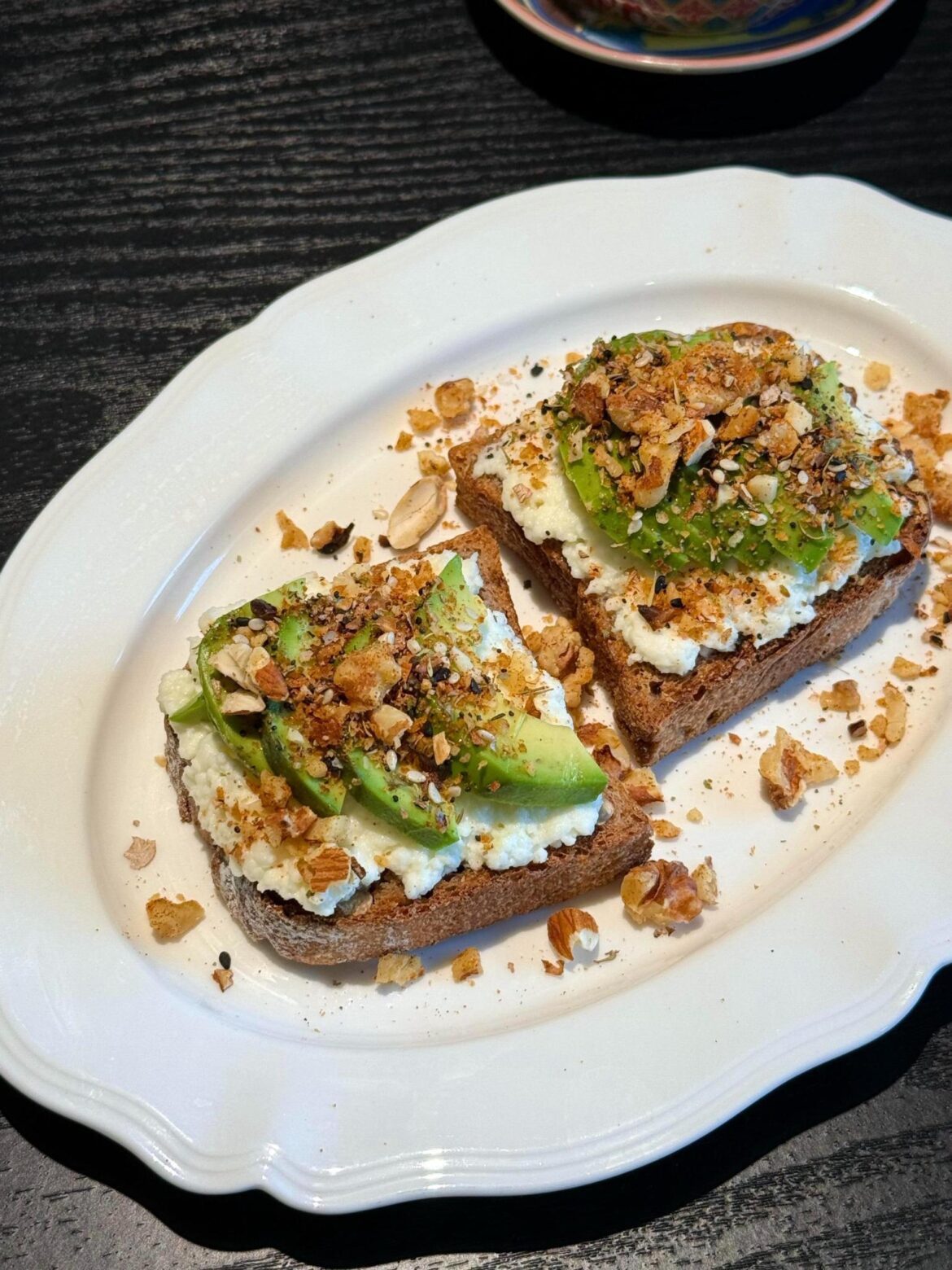 A quiet, satisfying breakfast: avocado ricotta toast