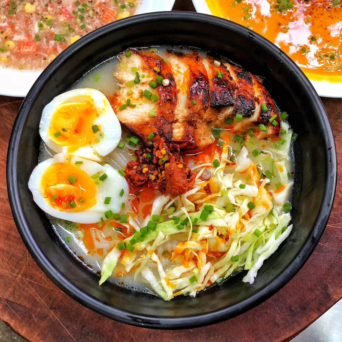 Tried building a brighter, fresher ramen bowl grilled chicken, soft-boiled eggs, and cabbage over a light broth. What would you add?