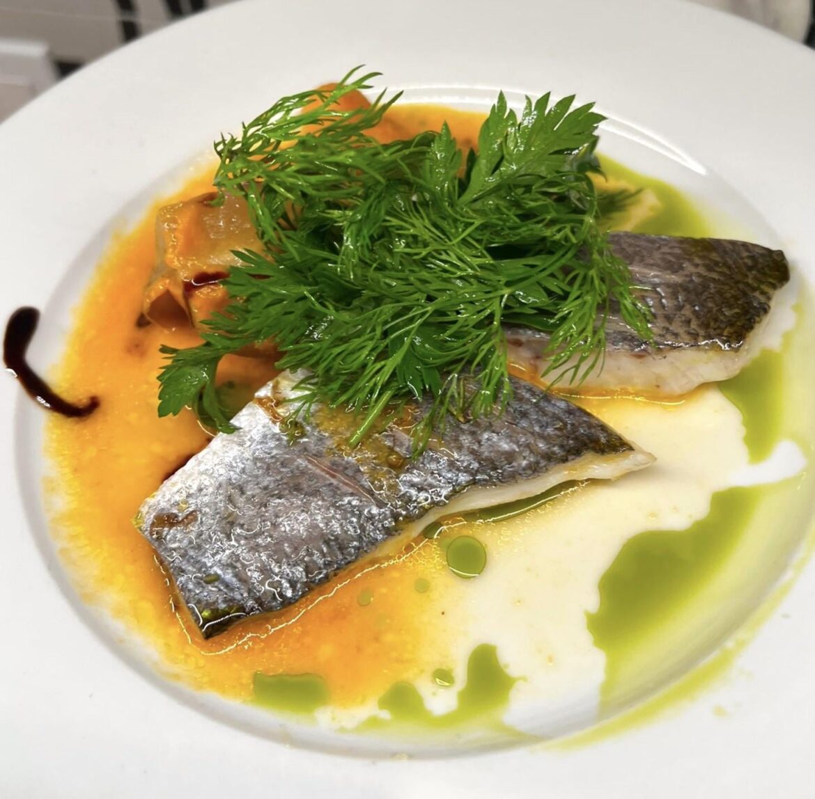 Sea bass, braised fennel, micro herbs, green apple, fennel-citrus sauce
