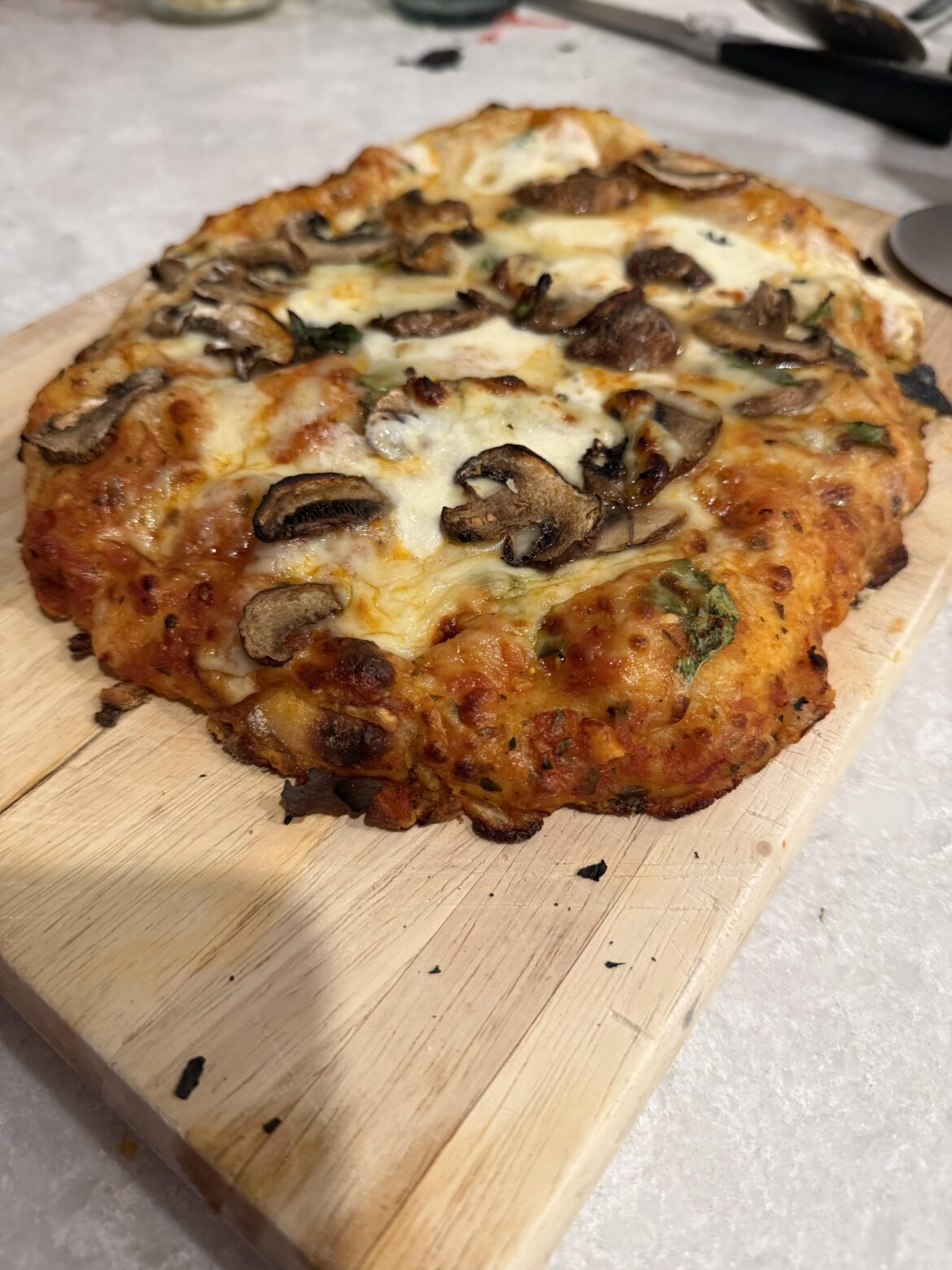 First pizza on the Joe (after I messed up and it was kinda stuck to the peeler)