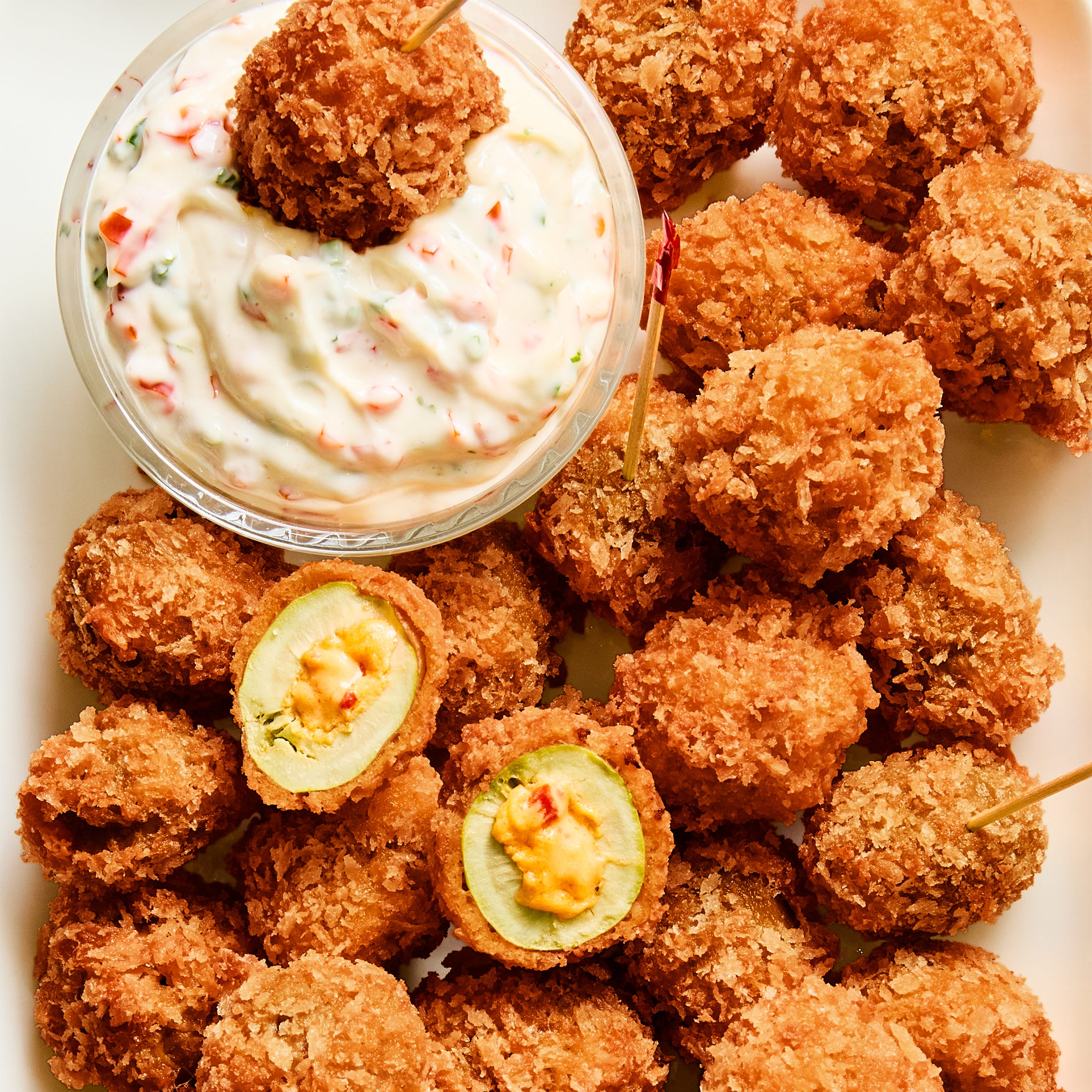 salty pimento cheese stuffed olives with pimento dip
