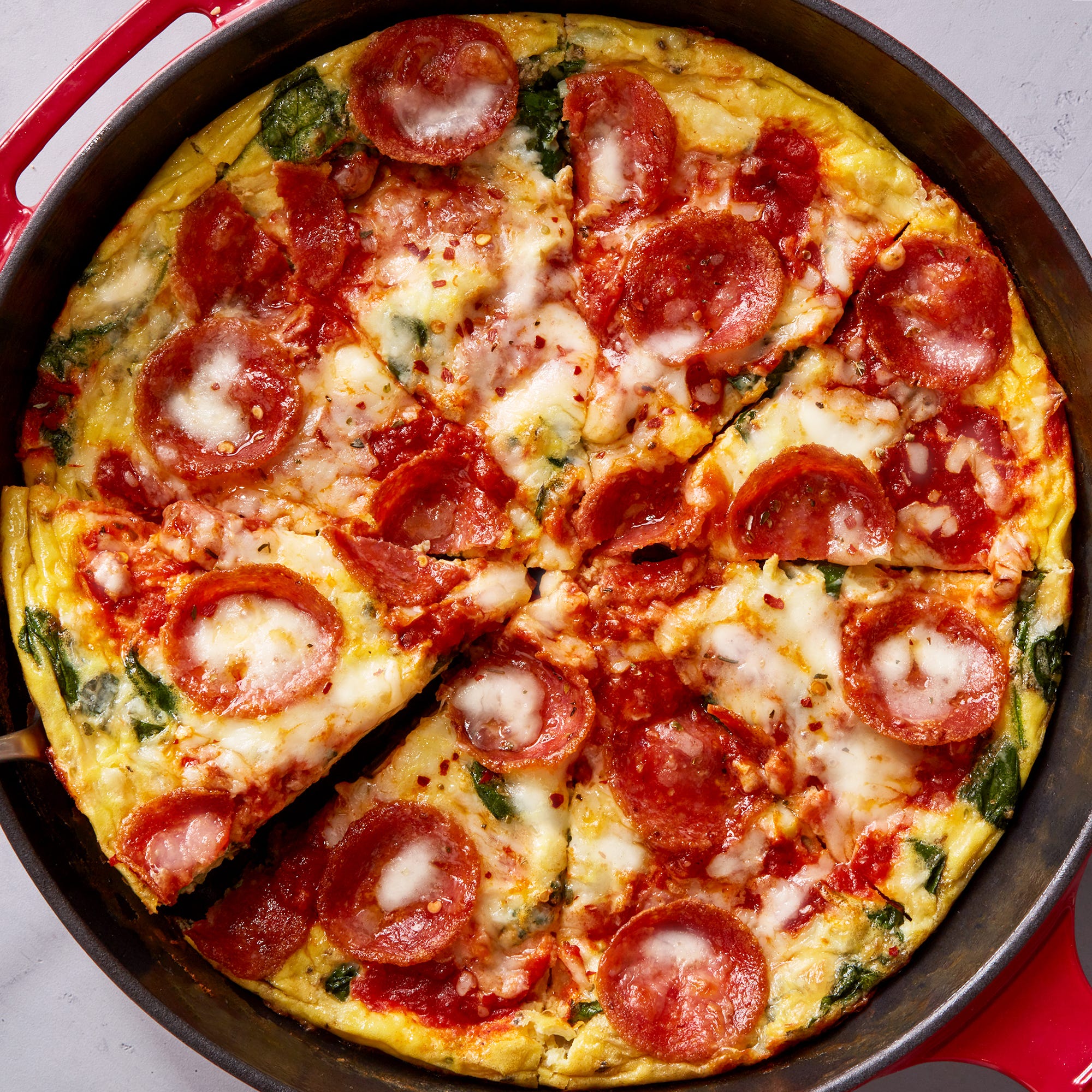 skillet frittata topped with pepperonis
