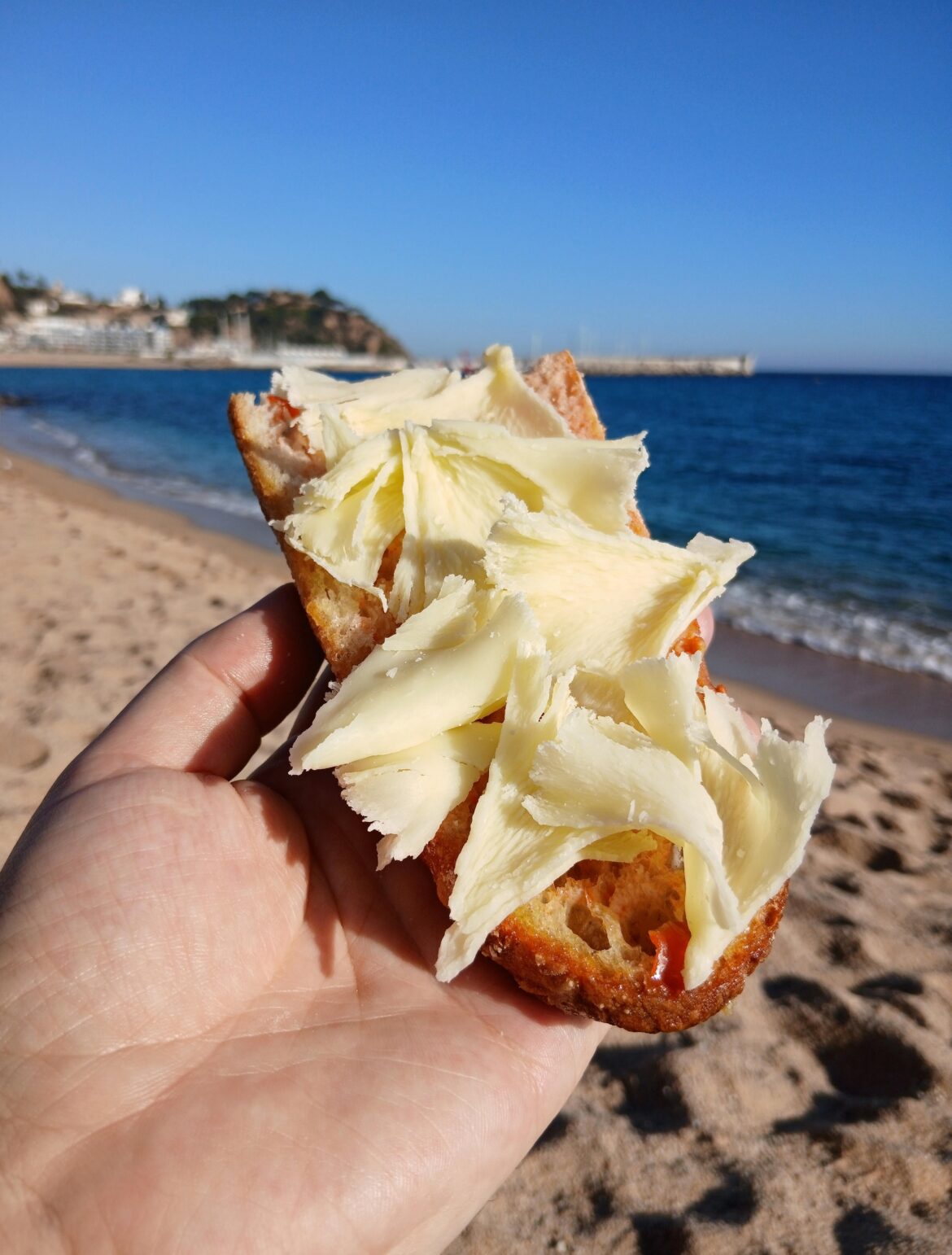 [I ate] tête de moine on a Catalan baguette rubbed with tomàquet de penjar and drizzled with arbequina olive oil