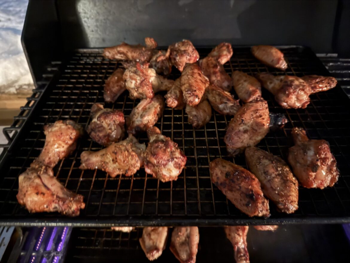 New grilling technique. Salt, pepper and dried minced garlic on a cookie sheet in the grill.