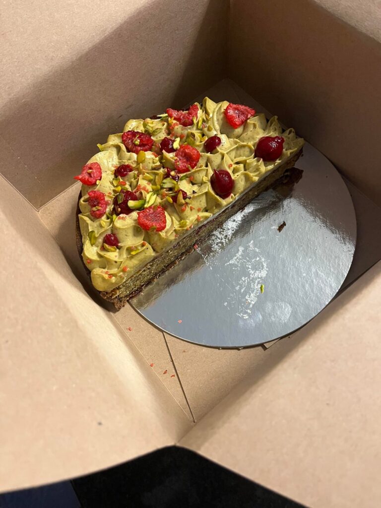 What do you guys think for this entire half of pistachio Bakewell tart? The topping was a bit like cream cheese, not very sweet. Second image shows it cut in half. Thanks:)