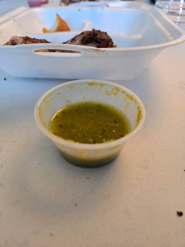 Jerk chicken from Cayman Islands. Green hot sauce / salsa?