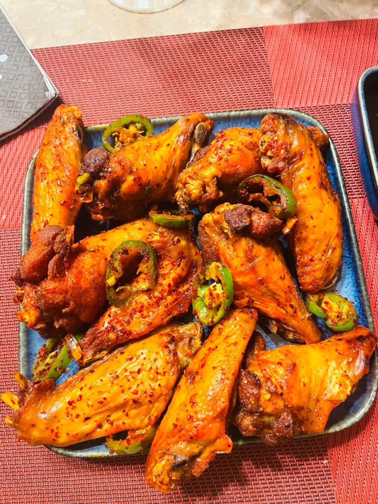 Salt & Pepper wings, Jalapeños. Ginger dipping sauce.