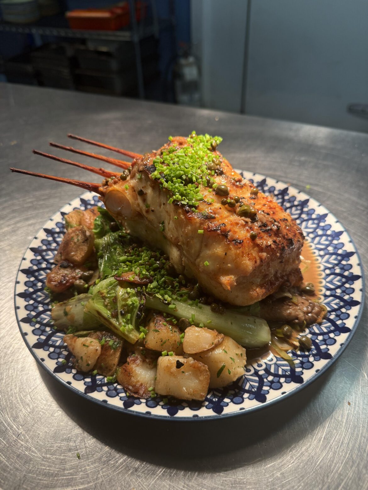 Bone-in charcoal grilled halibut chop, duck fat confit potatoes w/tokyo bekana (OC)