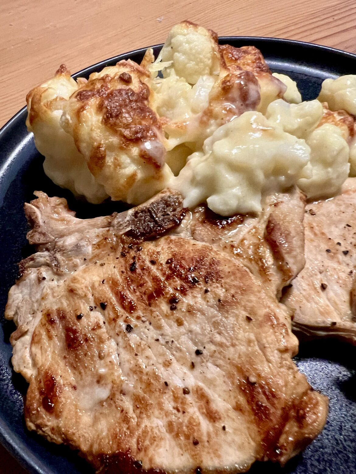 Pork chops and baked cauliflower