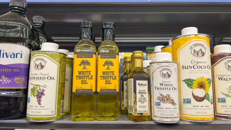 Bottles of truffle oil on a shelf at a store