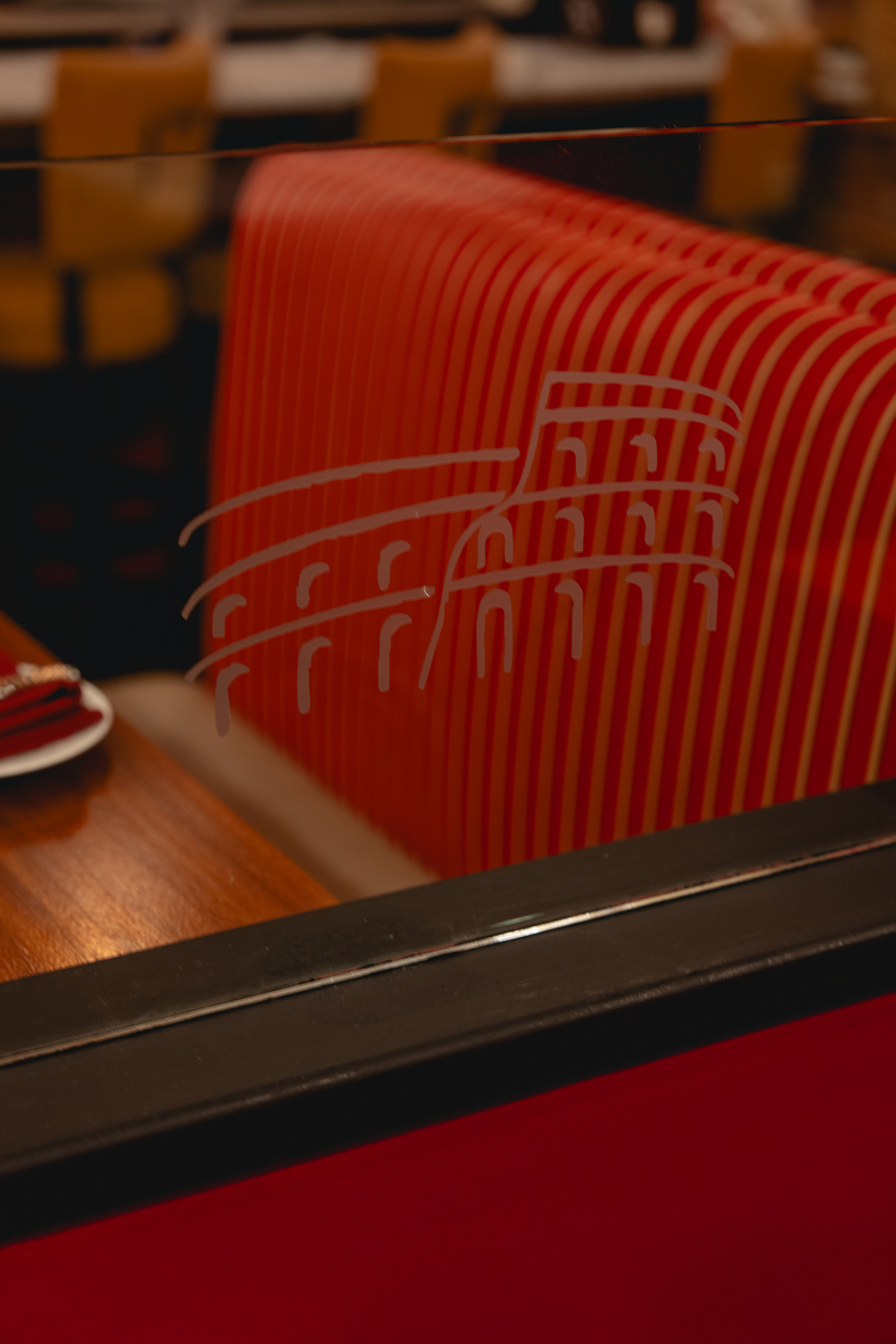 An artist’s rendition of Rome’s Colosseum is etched on the...