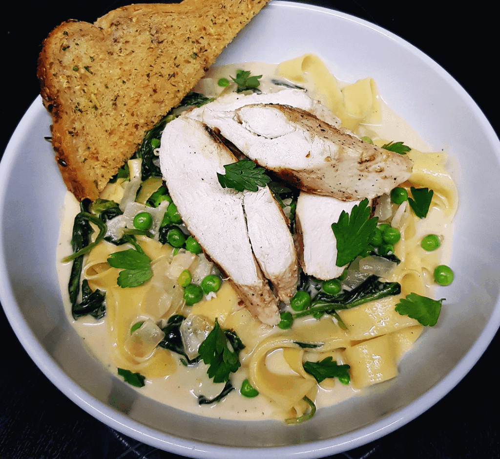 Chicken Florentine Pea Pappardelle with White Wine Mustard Cream Sauce. Plus Garlic Toasts. Sous Vide/ Pan Fried Chicken.
