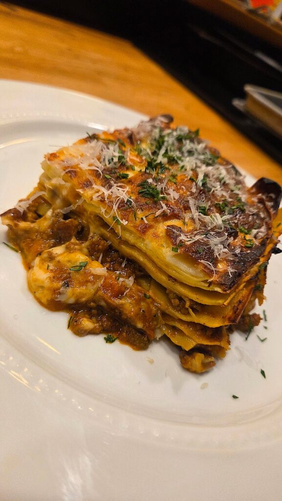 Lasagna Bolognese. Fresh pasta sheets is the way to go, IMO.