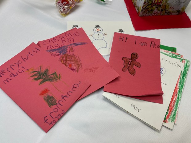 Handmade Christmas cards created by students of Katie VanSledright's first grade class at Will L. Lee Elementary School greeted diners at their tables. (MITCH HOTTS -- THE MACOMB DAILY)