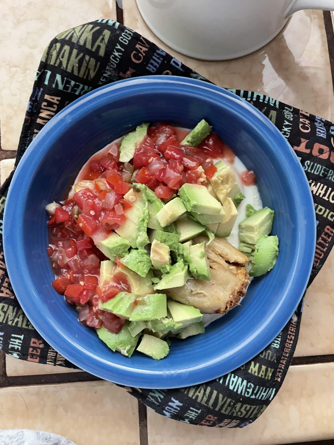 Tamale w/ eggs, salsa, and avocado