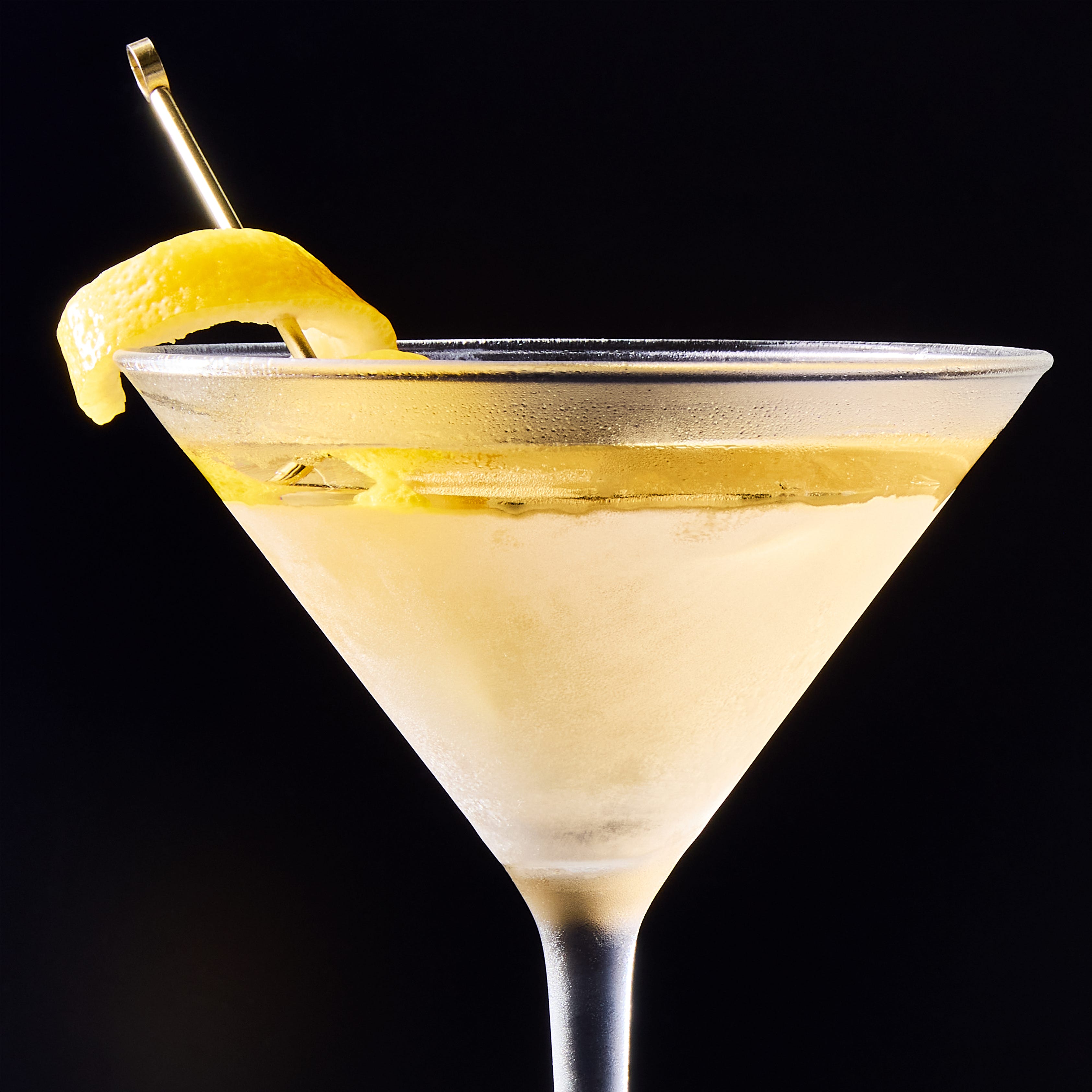 james bond's classic drink order with gin, vodka. lillet and a lemon twist