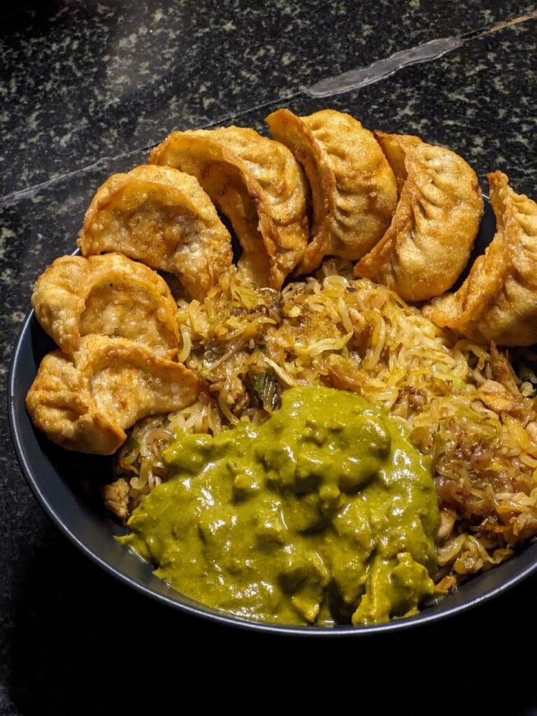Stir Fried Noodles and Deep Fried Pork Dumplings with Spicy Spinach Sauce