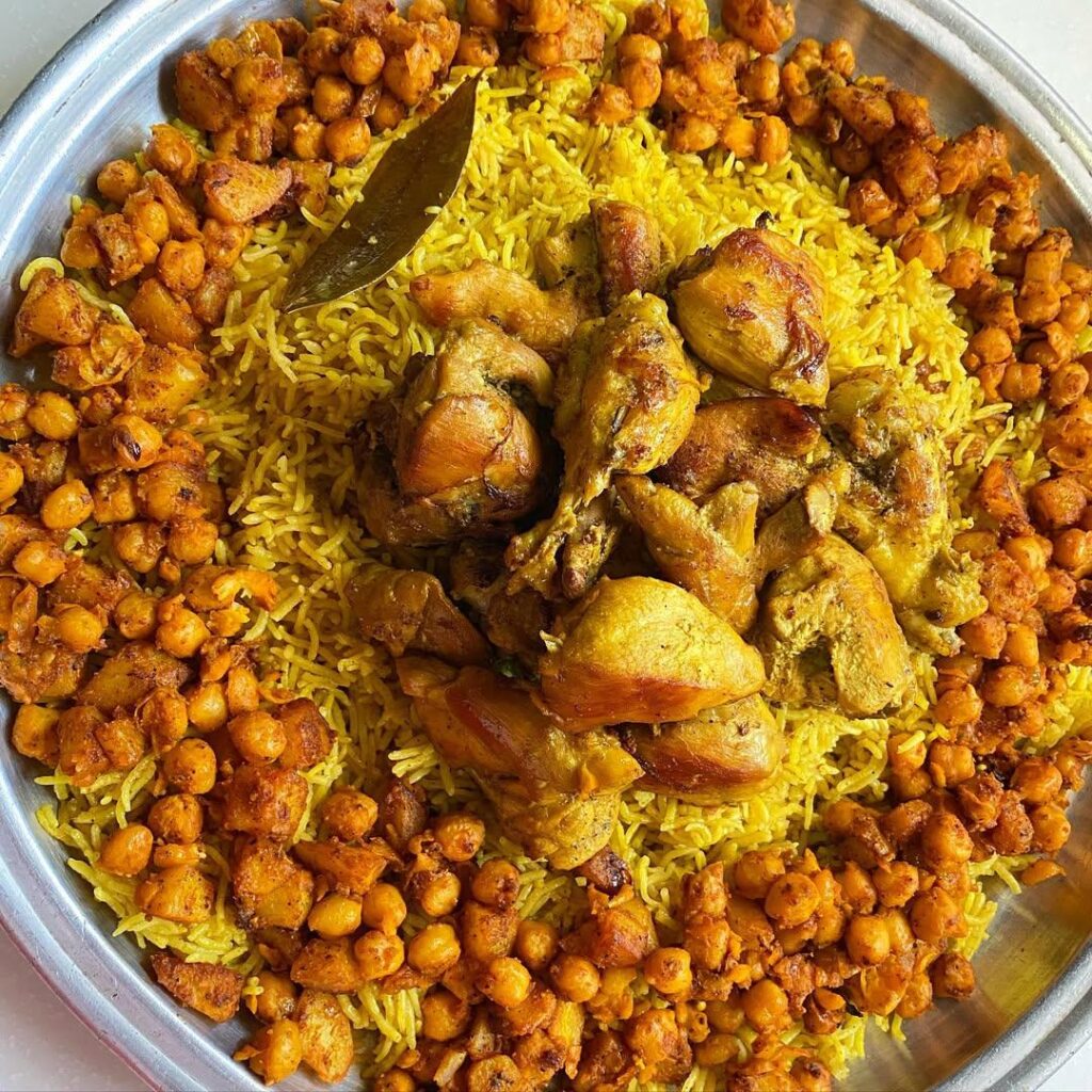 Persian Goboli with Caramelized Onions, Spiced Chicken, Potatoes and Golden Rice [OC]