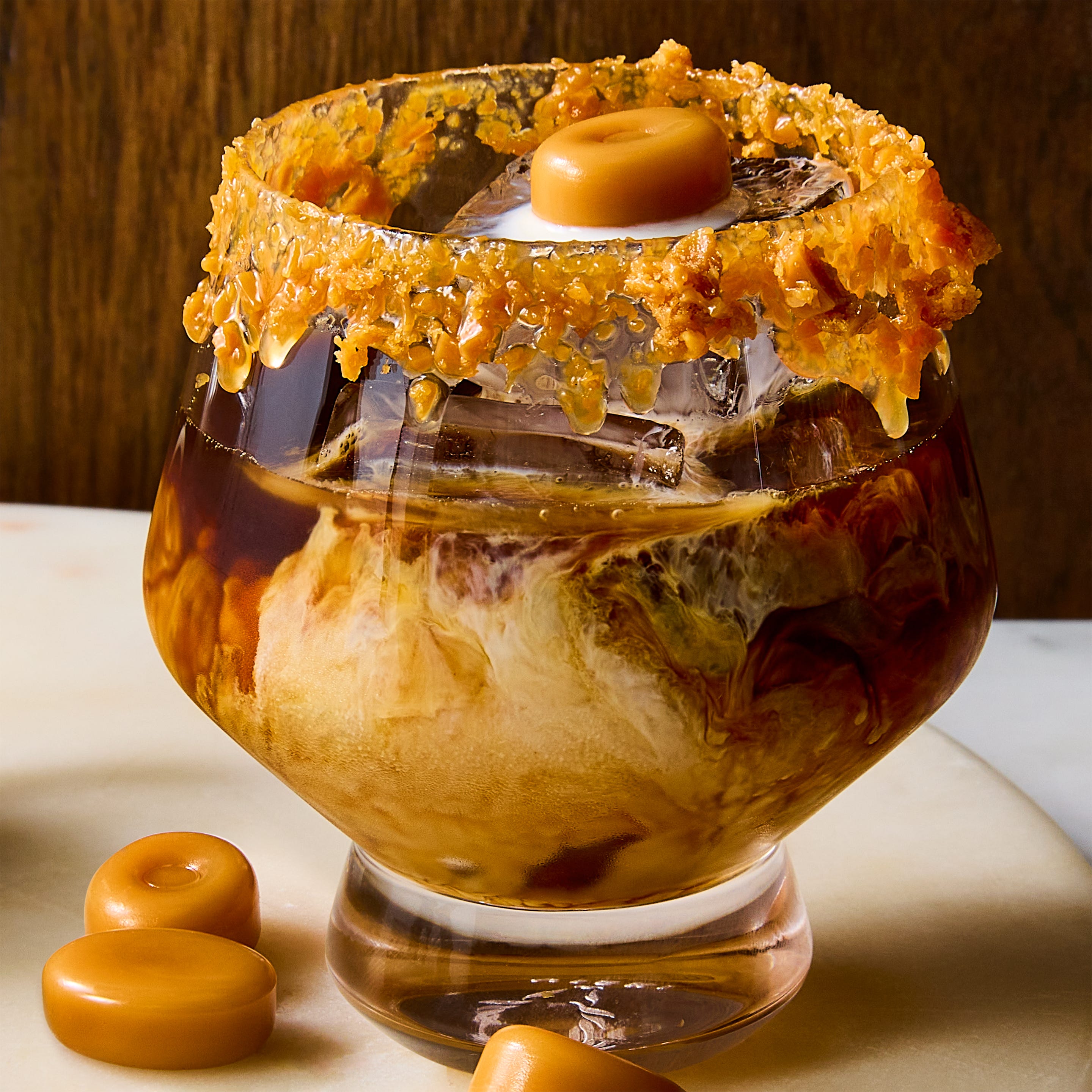 white russian cocktail with caramel and werthers candy