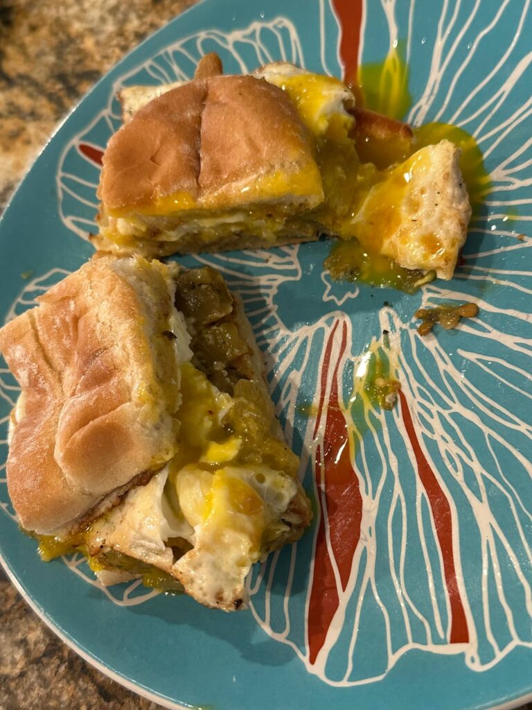 Fried Egg Sandwich with NM Green Chili & Cheese on Buttered Grilled Deli Roll