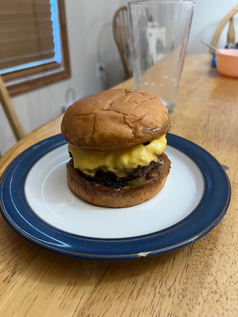 Classic cheeseburger. First time trying to make a thicker burger.
