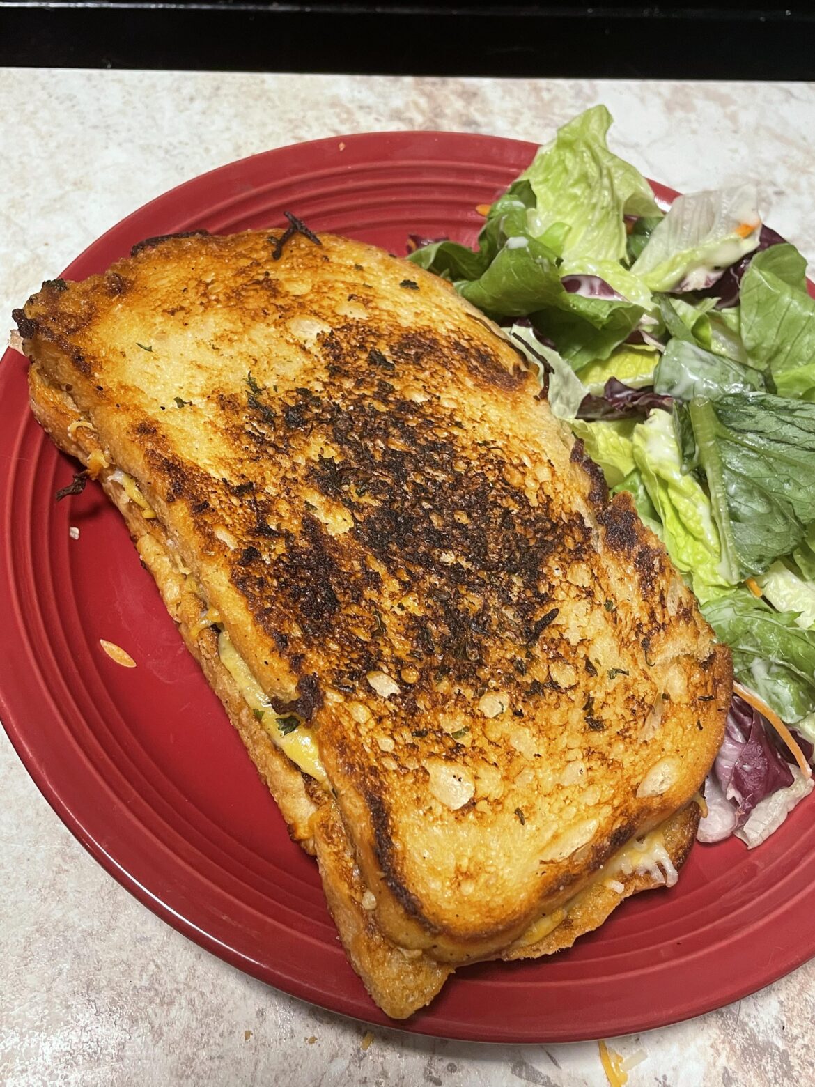 Rate my grilled cheese? Sourdough bread topped with butter & garlic salt, mild cheddar & Monterrey jack cheese