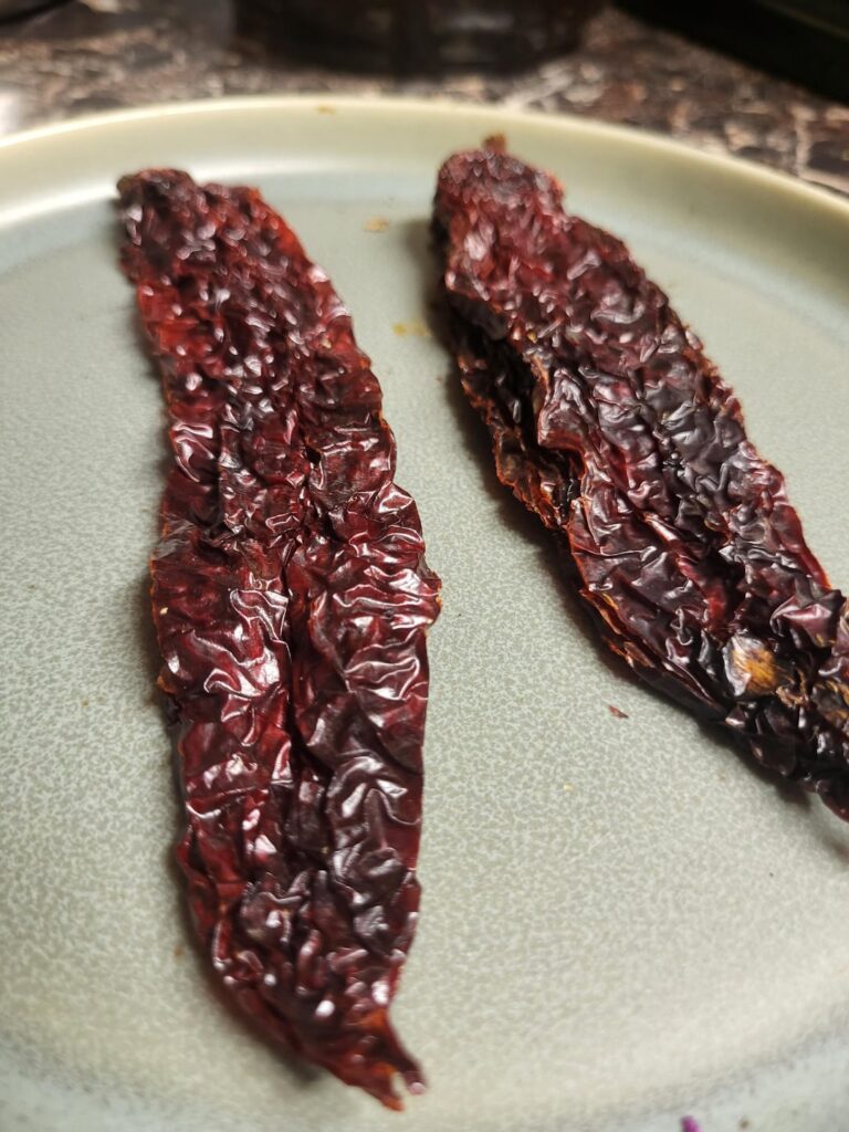 These beautiful Pasilla Oaxaca chiles have a smoky/fruity smell and flavor. The salsa is delicious!