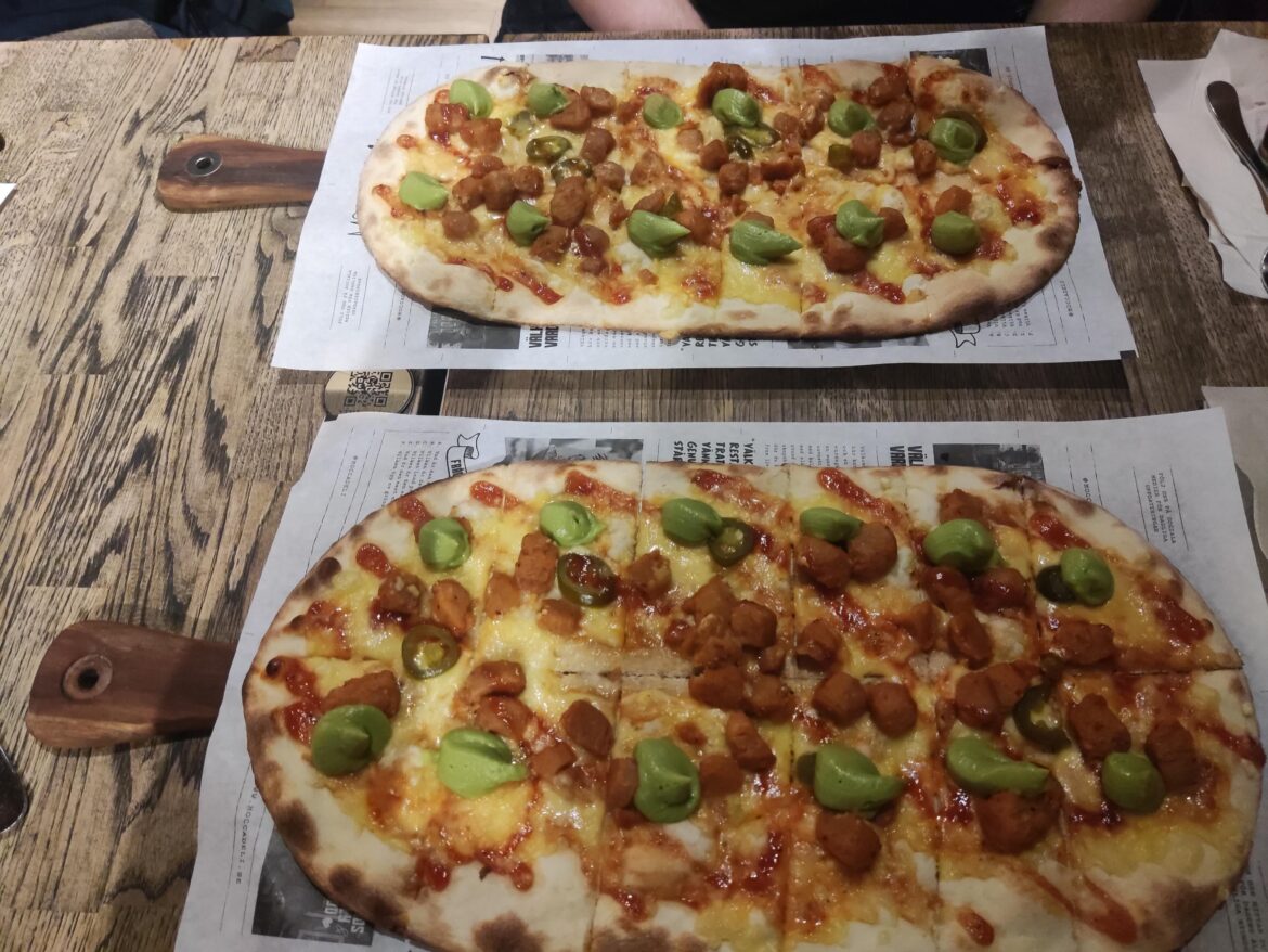 Cutting board and newspaper.