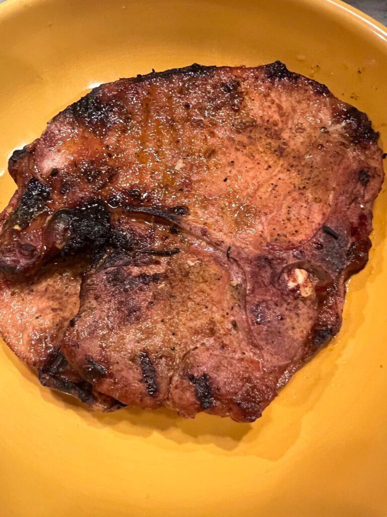 Pork Chops, Dry rub chicken breasts, grilled vegetables and potato wedges - all on the Weber Kettle 22