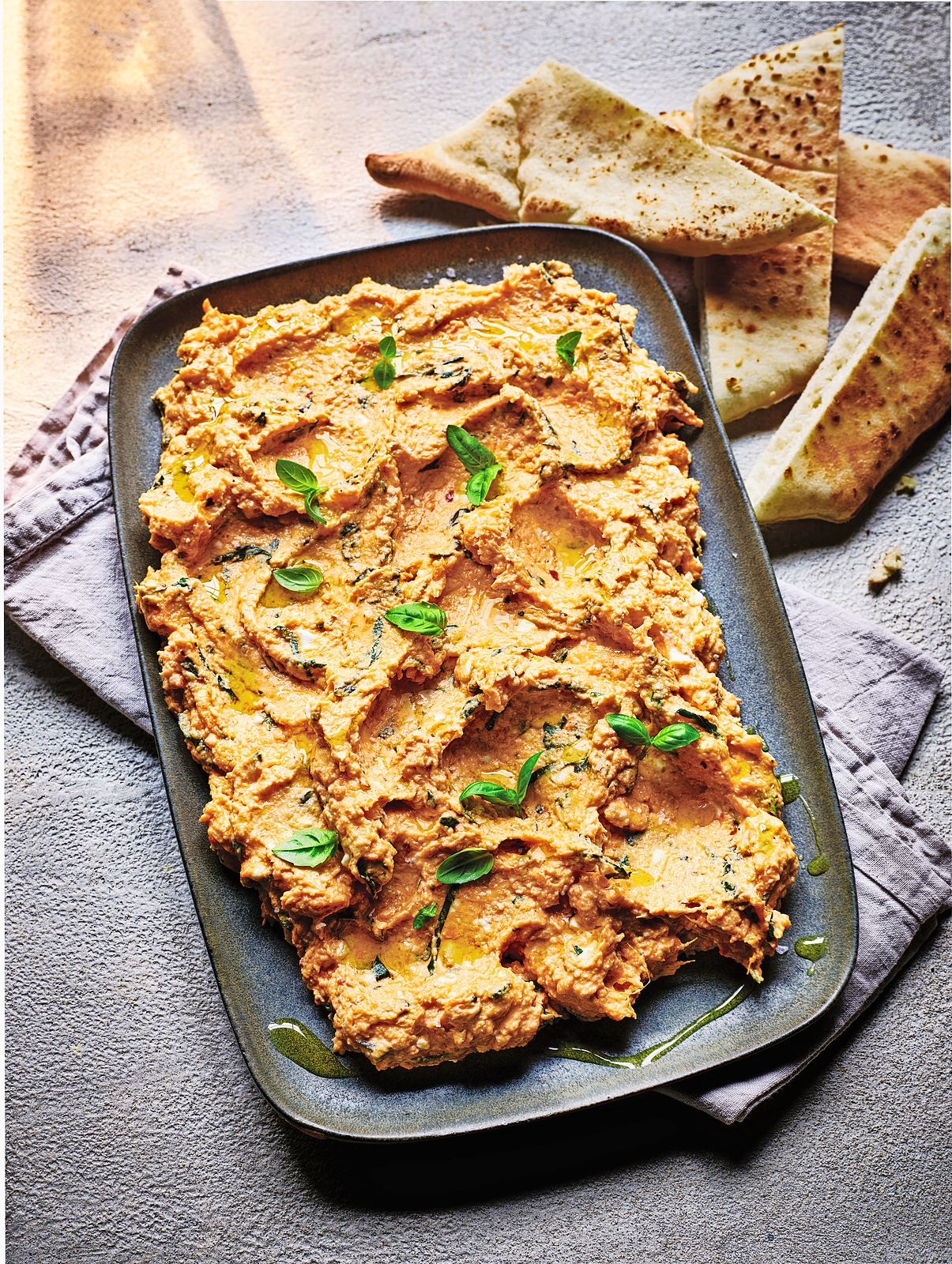 Sweet potato dip with pita bread.