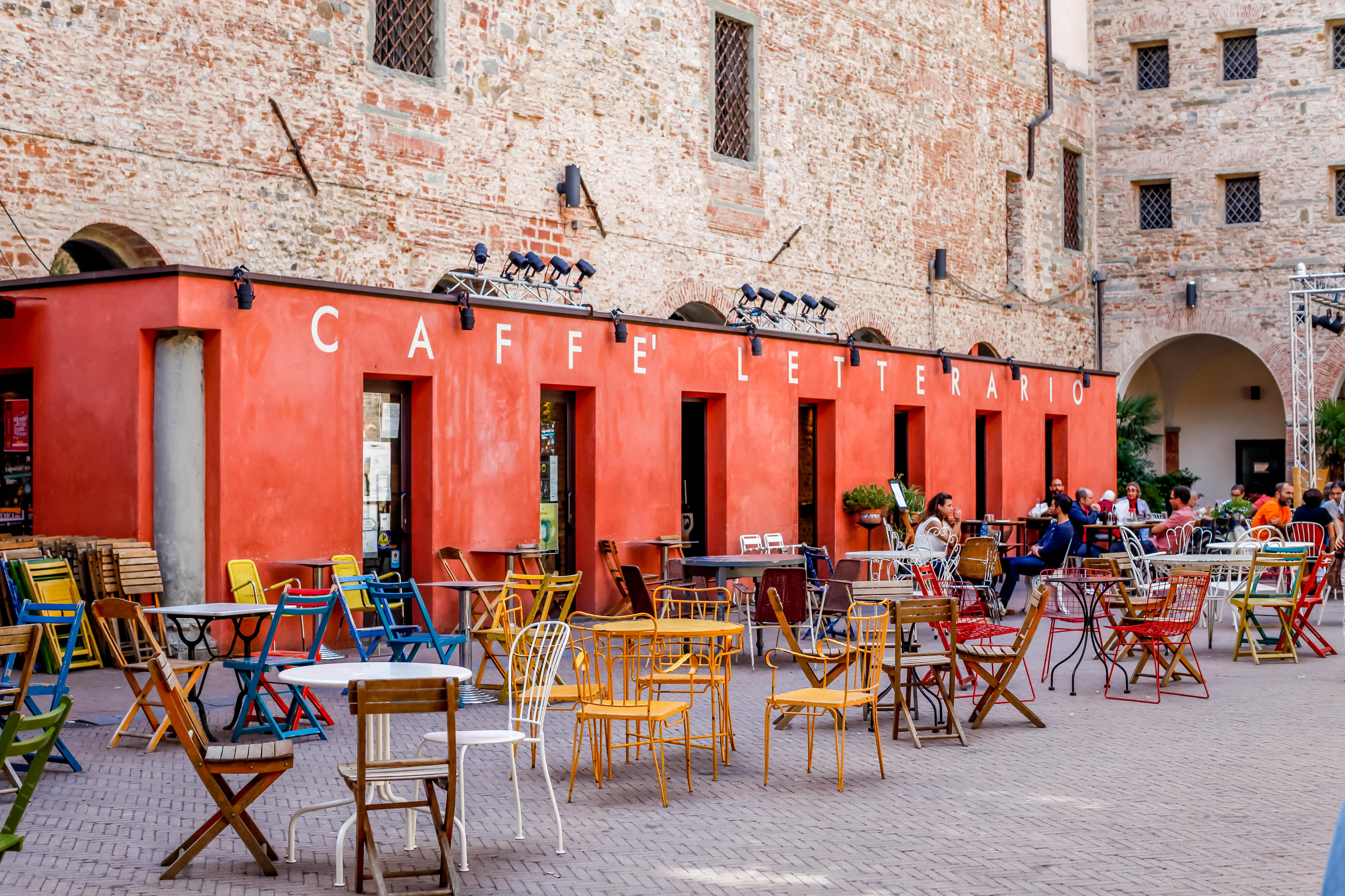 LE Murate Caffe Letterario with patrons on Piazza delle Murate in Florence, Italy.