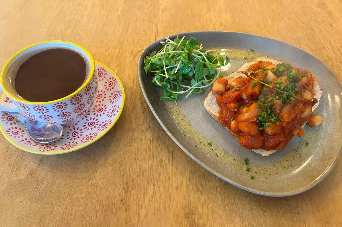 My delicious beans on toast and black coffee from Le Haricot