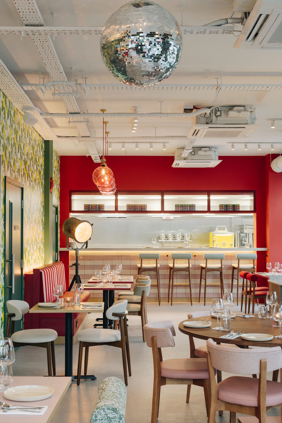A disco ball in Vieni's Sicilian-inspired dining room