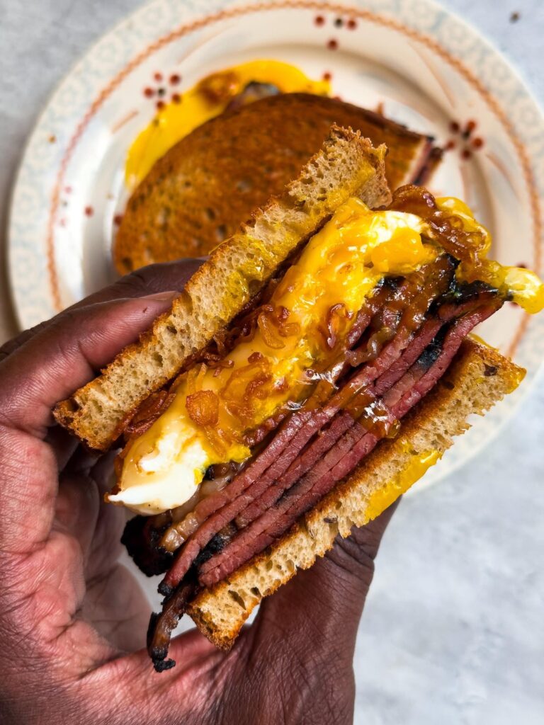 Pastrami, fried eggs, Swiss cheese, and crispy shallots on rye.