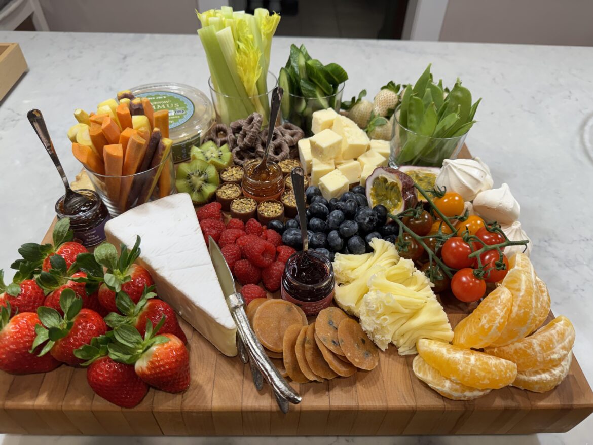 No meat, but here’s a cheese/fruit/veggie board I made for book club.