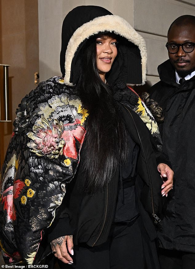 Rihanna greeted onlookers with a smile as she made her way towards a waiting car