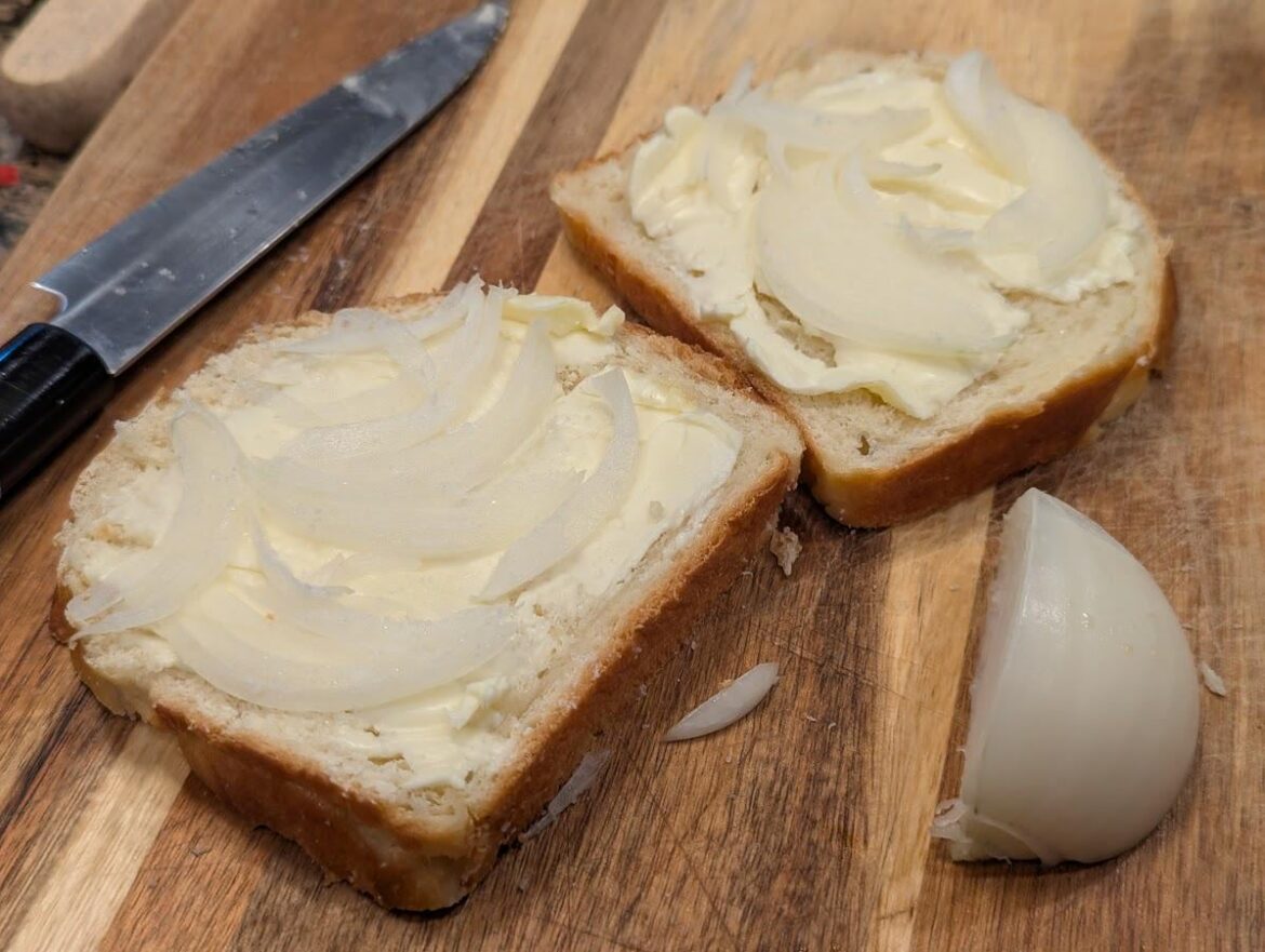 A proper Polish sandwich my mother-in-law made for my father-in-law, and my kid. Onions and butter on a freshly baked loaf of my bread.