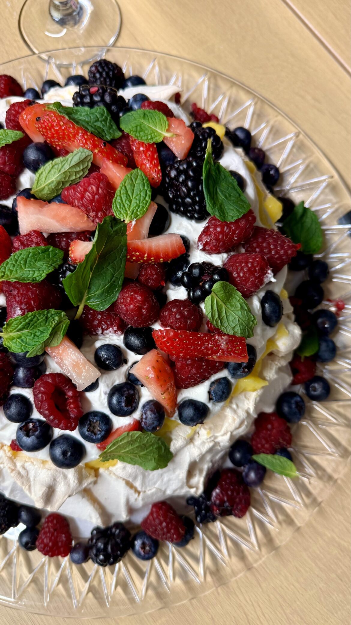 Homemade Pavlova with lemon custard & fresh berries