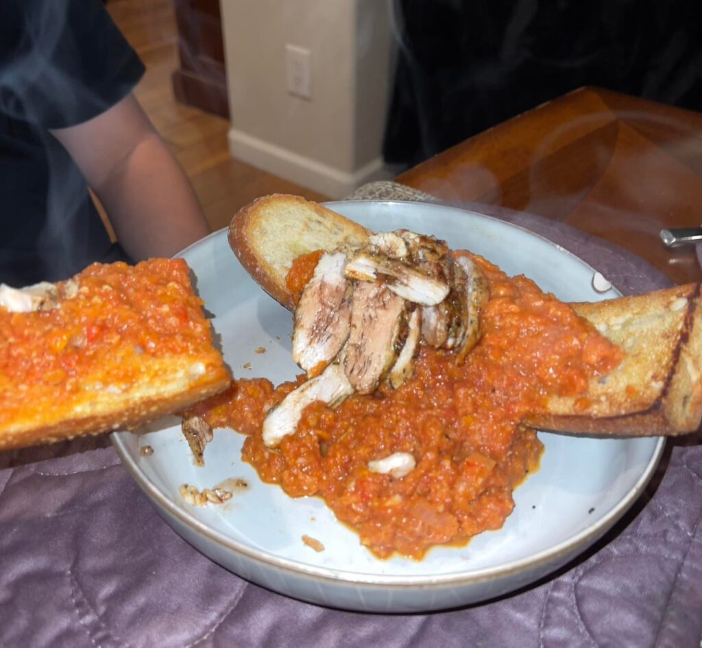 My brother eats this every night. Half of an entire baguette smothered in marinara sauce and chicken.