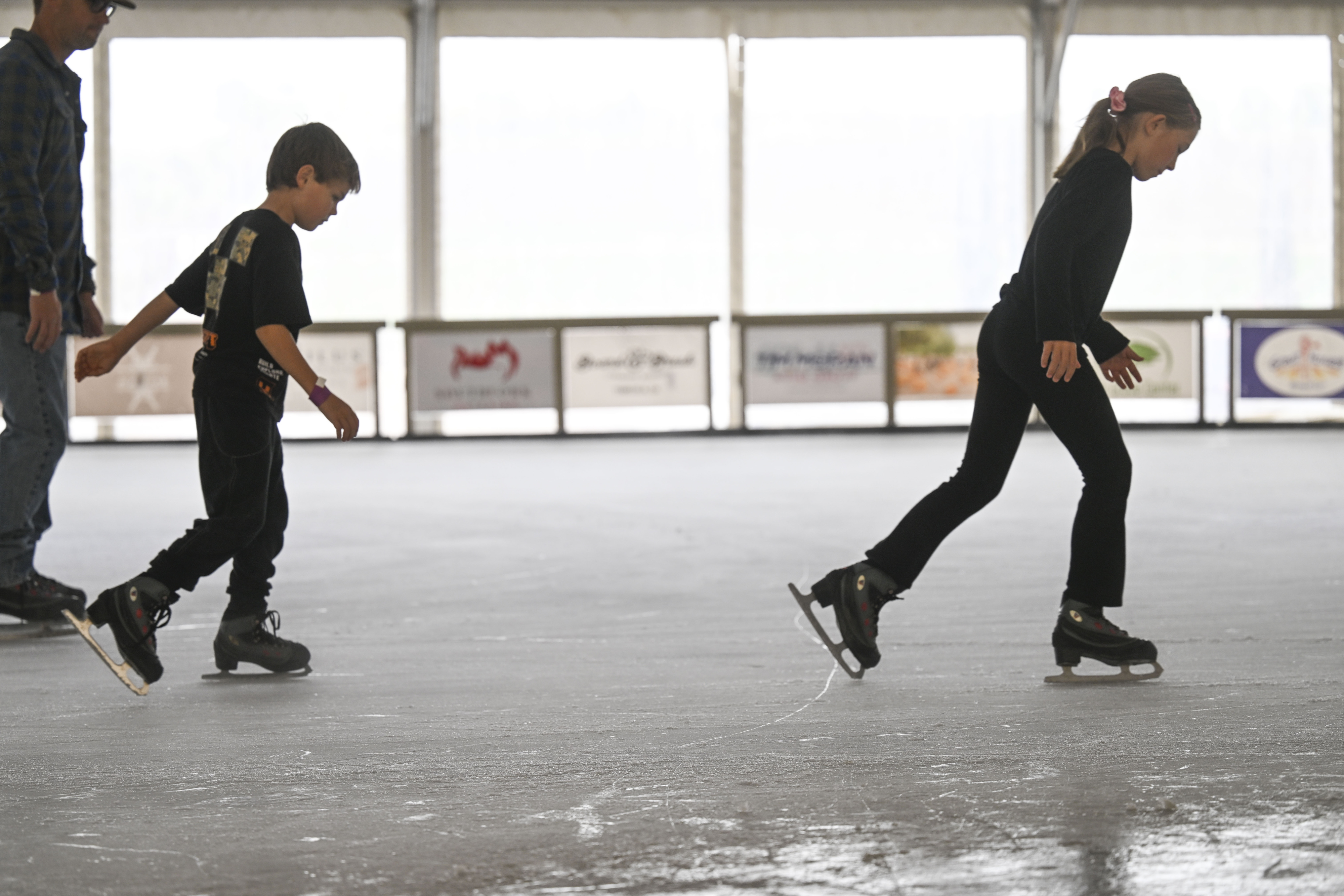 Children and adults enjoy the ice rink at Peltzer Winery...