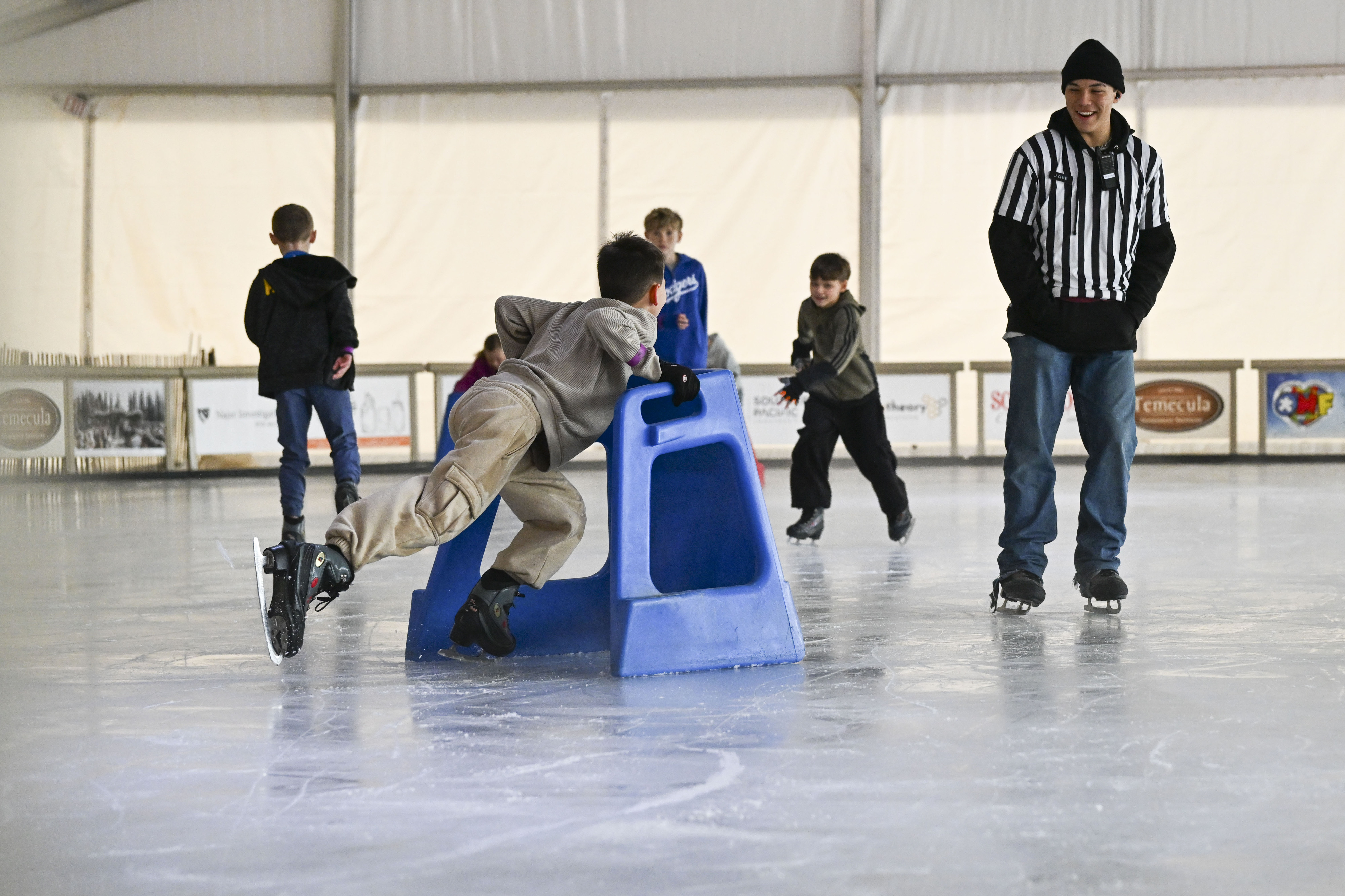 Children enjoy the ice rink at Peltzer Winery in Temecula...