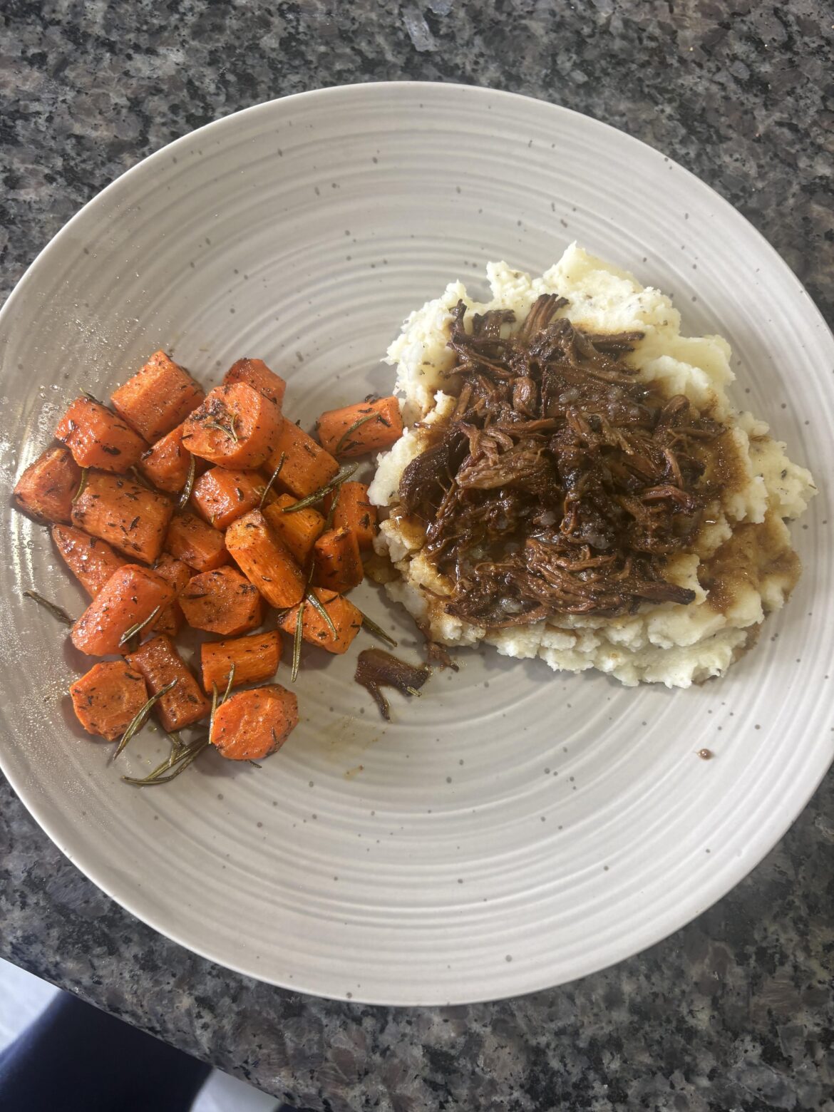 Balsamic honey mustard chuck roast over mashed potatoes with carrots